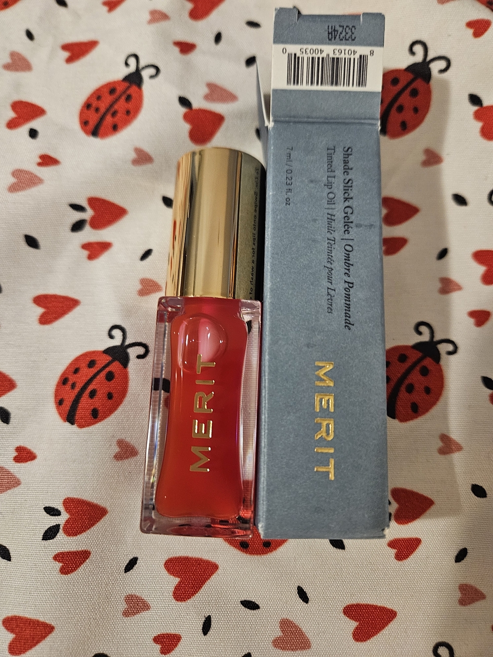 MERIT Shade Slick Tinted Lip Oil — Bold Red Tint Maraschino